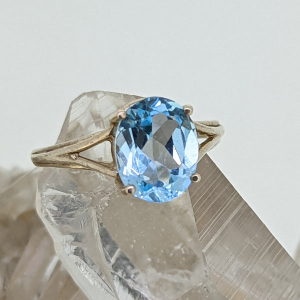 Sterling Silver Ring Featuring Created Blue Topaz