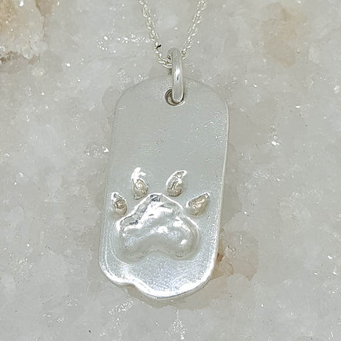 Sterling silver paw print necklace, custom made by Ron Emanuel